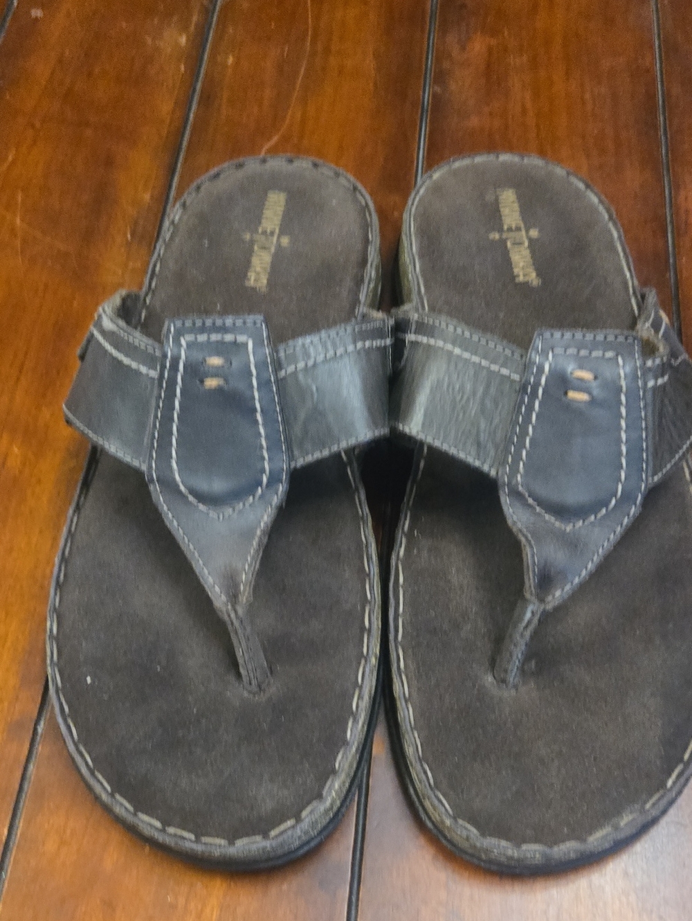 Minnetonka Black Leather Thong Sandals